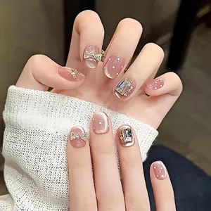 Faux ongles faits main œil de chat rose avec nœuds argentés et strass, lot de 30
