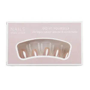 Handmade cat-eye press-on nails in nude pink gradient with a pearlescent finish