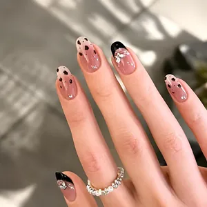 Handmade leopard print press-on nails with 3D bows and rhinestones in 30pcs set