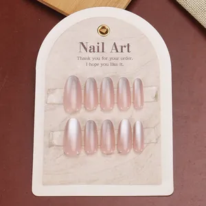 Pink gradient cat-eye press-on nails set with shimmer on almond shape nail tips
