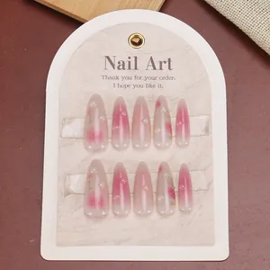 Pink gradient long almond press-on nails with 3D pearls and floral designs