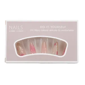 Long almond press-on nails in pink gradient with 3D water drops and floral patterns