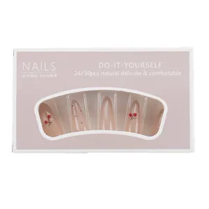 Pink gradient almond press-on nails set with red cherry and dot decorative designs