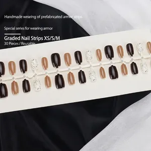 Short press-on nails in coffee brown and ink splash design with XS/S/M sizes