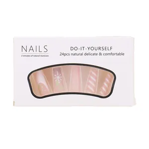 24-piece pink Christmas press-on nails with snowflakes and stripes in window box