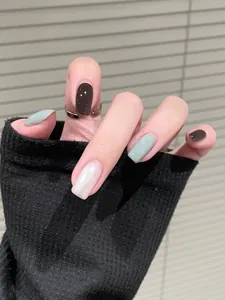Close-up of square press-on nails in Morandi brown, sage green, and pearly glitter