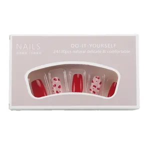 Short red and pink heart press-on nails with shiny finish for Valentine's Day style