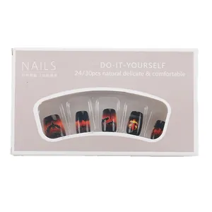 Short Halloween press-on nails set with orange black gradient and pumpkin motifs