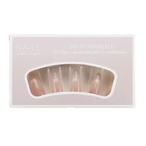 Faux ongles œil-de-chat dégradé rose de forme amande longue avec emballage chic