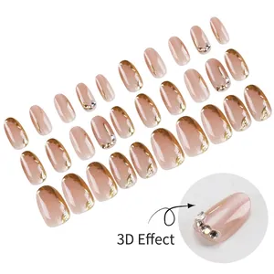 Short oval nude glitter press-on nails with 3D gold embossed lines and rhinestones