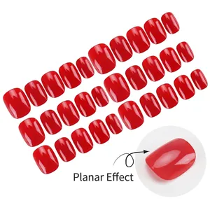 Glossy cherry red short press-on nail set with 24 pieces in a flat layout display