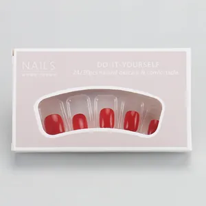 Short round cherry red press-on nails in a professional box with viewing window