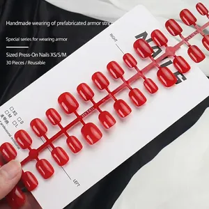 Deep cherry red short almond press-on nails set with 30 pieces and size labels