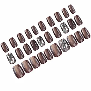 Brown cat eye press-on nails with luxury 3D crystals and glitter powder finish