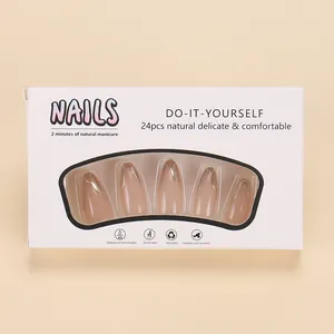 French style press-on nails set with silver metallic edges in elegant white packaging