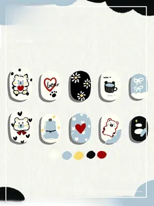 Detail of 10-piece cute cartoon nail press-ons featuring bear and daisy patterns