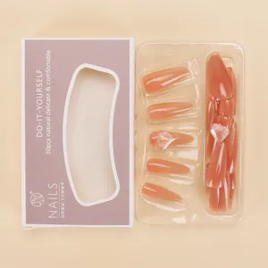 Macro shot of 30pcs long jelly pink glossy press-on nails in purple display packaging