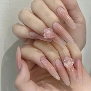 Pink gradient long almond press-on nails with 3D transparent heart-shaped rhinestones