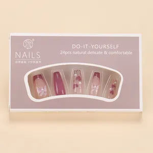 Detail of 24pcs handmade press-on nails with purple cat-eye heart and pearl designs