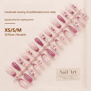 Handmade pink and purple cat-eye press-on nails with 3D hearts and butterfly accents