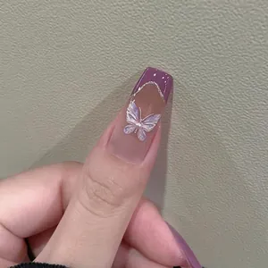 Handmade coffin press-on nails with purple French tips, 3D butterfly, and pearl accents
