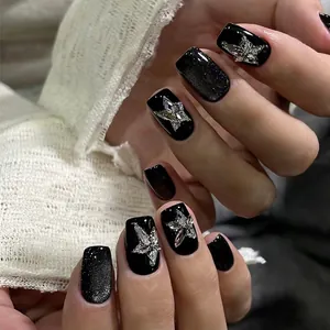 30PCS 3D glitter star nail charms in silver finish on black almond press-on nails