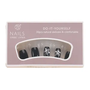 Short black square press-on nails with silver rhinestone flower accents and 30pcs set