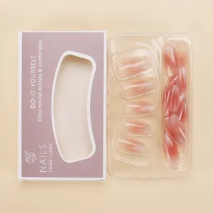 Detail of pink gradient press-on nails set in packaging with 30-piece variety size