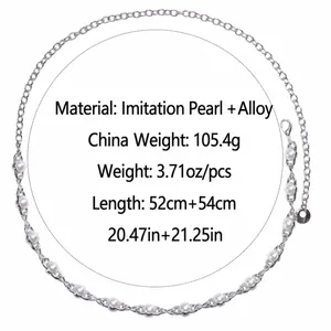Macro detail of elegant single-layer pearl waist chain with silver alloy adjustable clasp