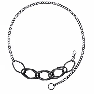 Detail of chunky black geometric hexagon links on a versatile metal chain belt