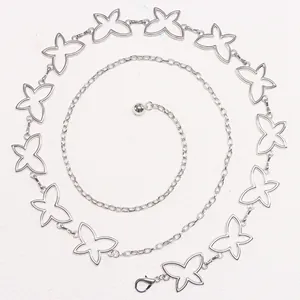 Detailed close-up of hollow butterfly metal waist chain with lobster clasp and silver beads