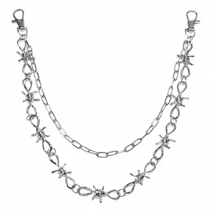 Detail of silver alloy double-layer punk waist chain with barbed wire thorns and metal clasps