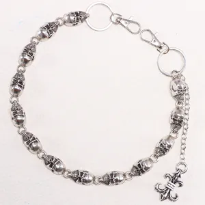 Punk style skull wallet chain with silver finish and fleur-de-lis charm accessory