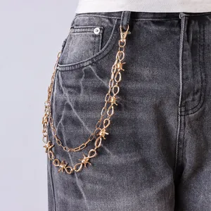 Punk style double layer gold thorn waist chain with lobster clasps on grey jeans