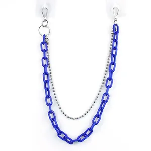 Detail of double-layer hip-hop trousers chain with blue acrylic links and silver bead metal