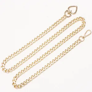 Fashionable gold metal curb chain waist belt with textured links and heart lobster clasp