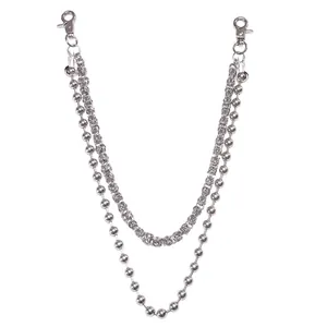 Detail of silver double-layered trousers chain with smooth ball and snake links