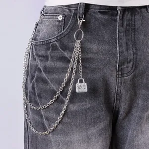 Punk style multi-layer silver pants chain with crystal padlock pendant on denim