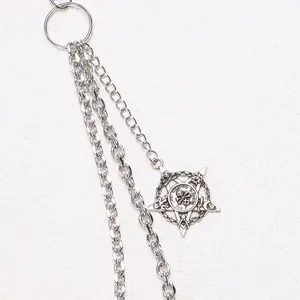 Gothic silver trousers chain featuring a detailed pentagram skull pendant with engraving