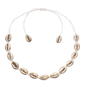 Collier en coquillage cauri doré bohème avec cordon tressé réglable pour femmes