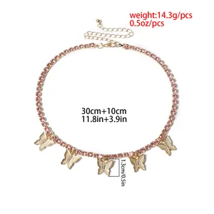 Elegant gold butterfly choker necklace with pink rhinestones and adjustable extension chain