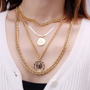 Layered gold vintage coin pendant necklace featuring multi-strand chains for women