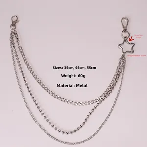 Detail of silver multi-layer metal pants chain with star pendant and lobster clasps