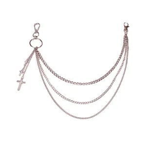 Three-layer silver metal pants chain with cross pendants and lobster clasps on white background