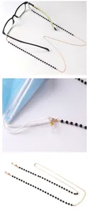 Detail of beaded glasses chain with lobster clasps and anti-slip silicone rings