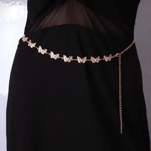 Punk style golden metal chain waist belt featuring sparkling butterfly charms and rhinestones
