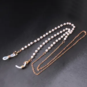 Elegant gold chain eyewear strap with white pearls and adjustable silicone ends
