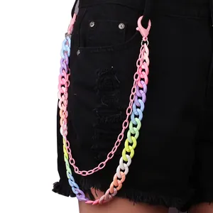 Detail of colorful double-layered acrylic pants chain on black denim shorts