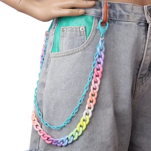 Detail of candy-colored double-layer resin waist chain styled on light blue denim shorts