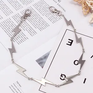 Detail of silver lightning bolt chain with swivel snap hooks for hip-hop punk style